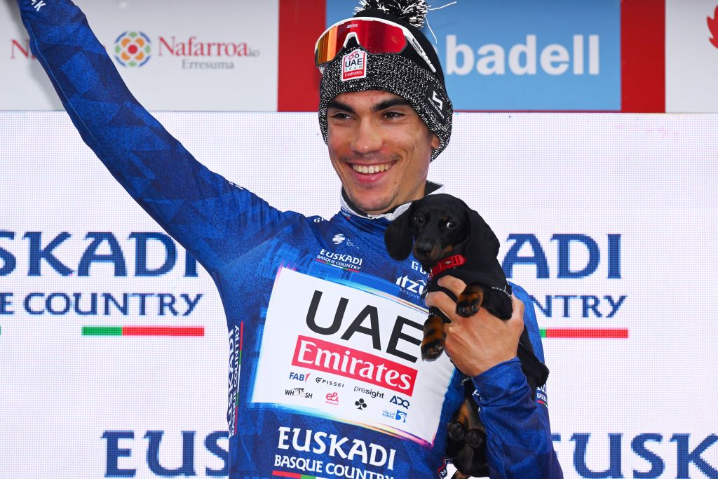 KANBO FRANCE APRIL 02 Juan Ayuso of Spain and UAE Team Emirates Blue Best Young Rider Jersey celebrates at podium during the 63rd Itzulia Basque Country 2024 Stage 2 a 160km stage from Irun to Kanbo UCIWWT on April 02 2024 in Kanbo France Photo by Tim de WaeleGetty Images