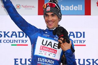 KANBO FRANCE APRIL 02 Juan Ayuso of Spain and UAE Team Emirates Blue Best Young Rider Jersey celebrates at podium during the 63rd Itzulia Basque Country 2024 Stage 2 a 160km stage from Irun to Kanbo UCIWWT on April 02 2024 in Kanbo France Photo by Tim de WaeleGetty Images