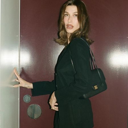 image of Hailey Bieber with Chanel small flap bag