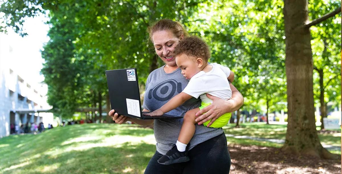 woman and child benefiting from digital education program