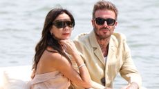 victoria and david beckham on a boat in italy