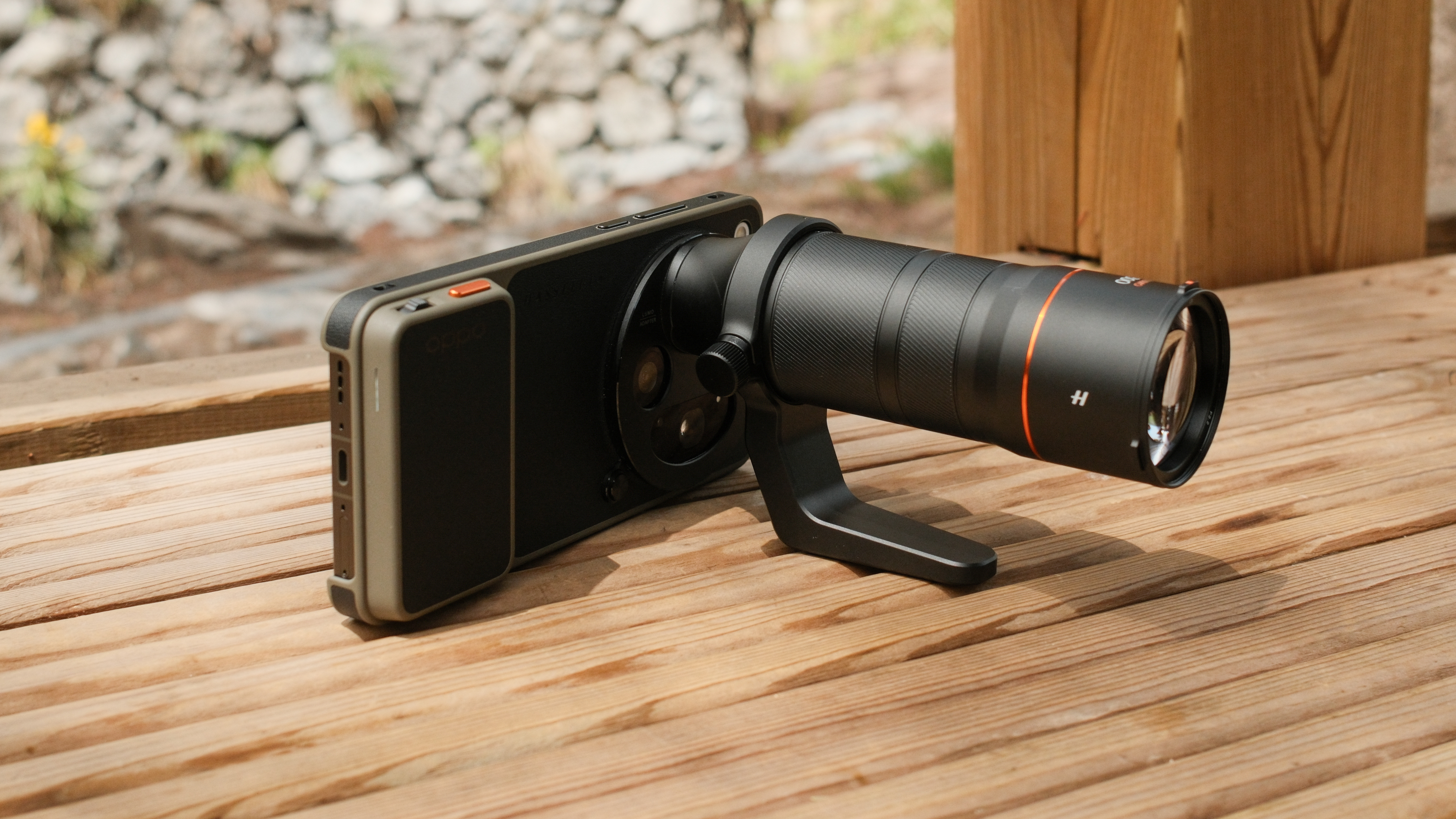 Oppo Find X9 Ultra phone with telephoto lens attached