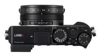 The LX100 II features a shutter speed dial on the top plate and an aperture ring on the lens barrel.