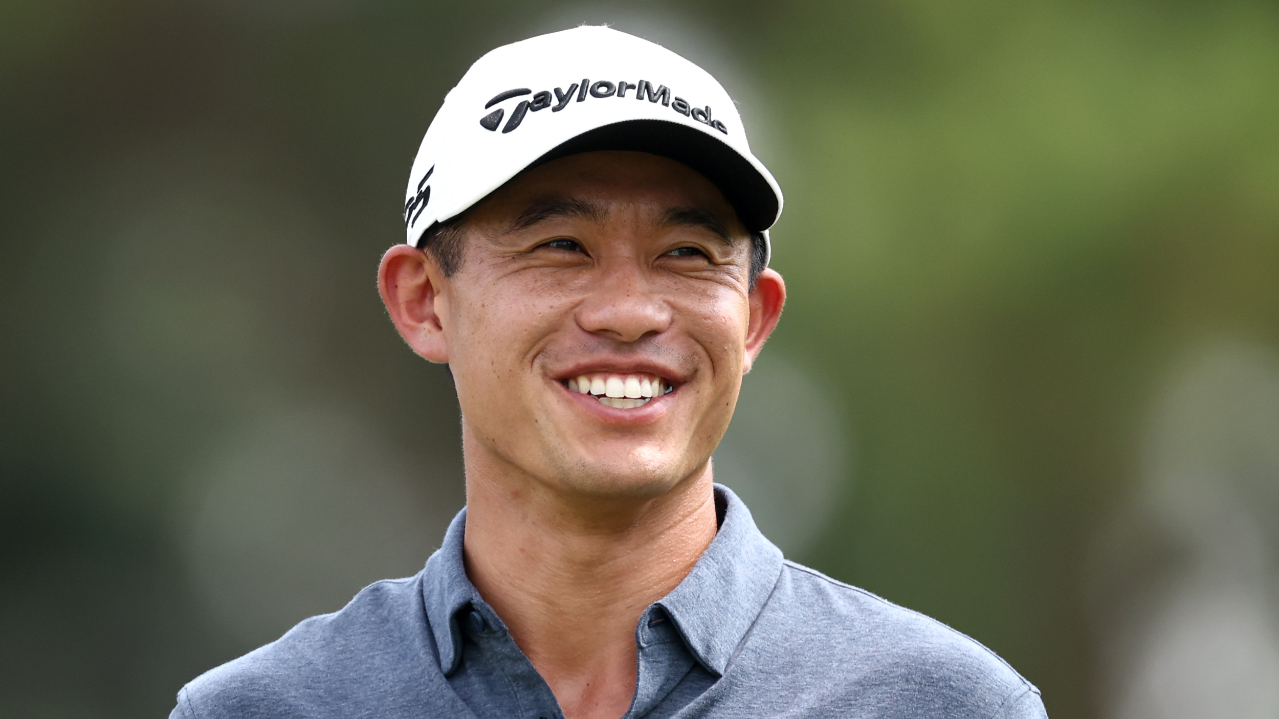 Collin Morikawa smiles at the Tour Championship