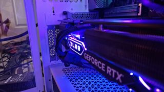 PNY GeForce RTX 4070 Ti inside a gaming pc showing the cable converter PNY provides