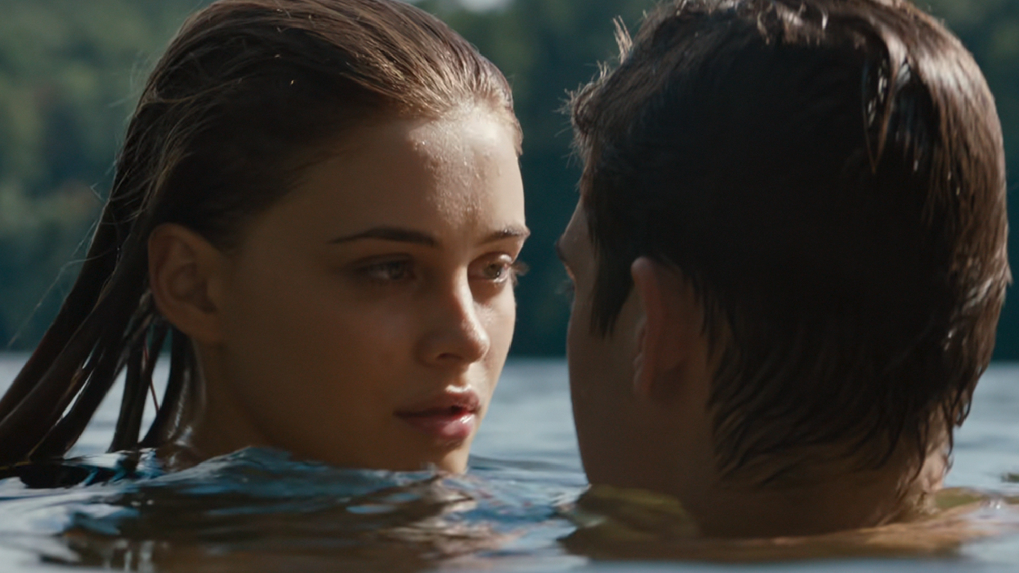 A woman and a man swimming in After