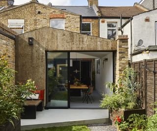 cork clad small extension with angled pitched roof