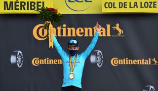 Stage winner Team Astana rider Colombias Miguel Angel Lopez celebrates on the podium after winning atop the Loze pass Col de la Loze at the end of the 17th stage of the 107th edition of the Tour de France cycling race 170 km between Grenoble and Meribel on September 16 2020 Photo by Stuart Franklin POOL AFP Photo by STUART FRANKLINPOOLAFP via Getty Images