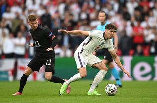 John Stones is closed down by Timo Werner in England's last-16 clash with Germany at Euro 2020.