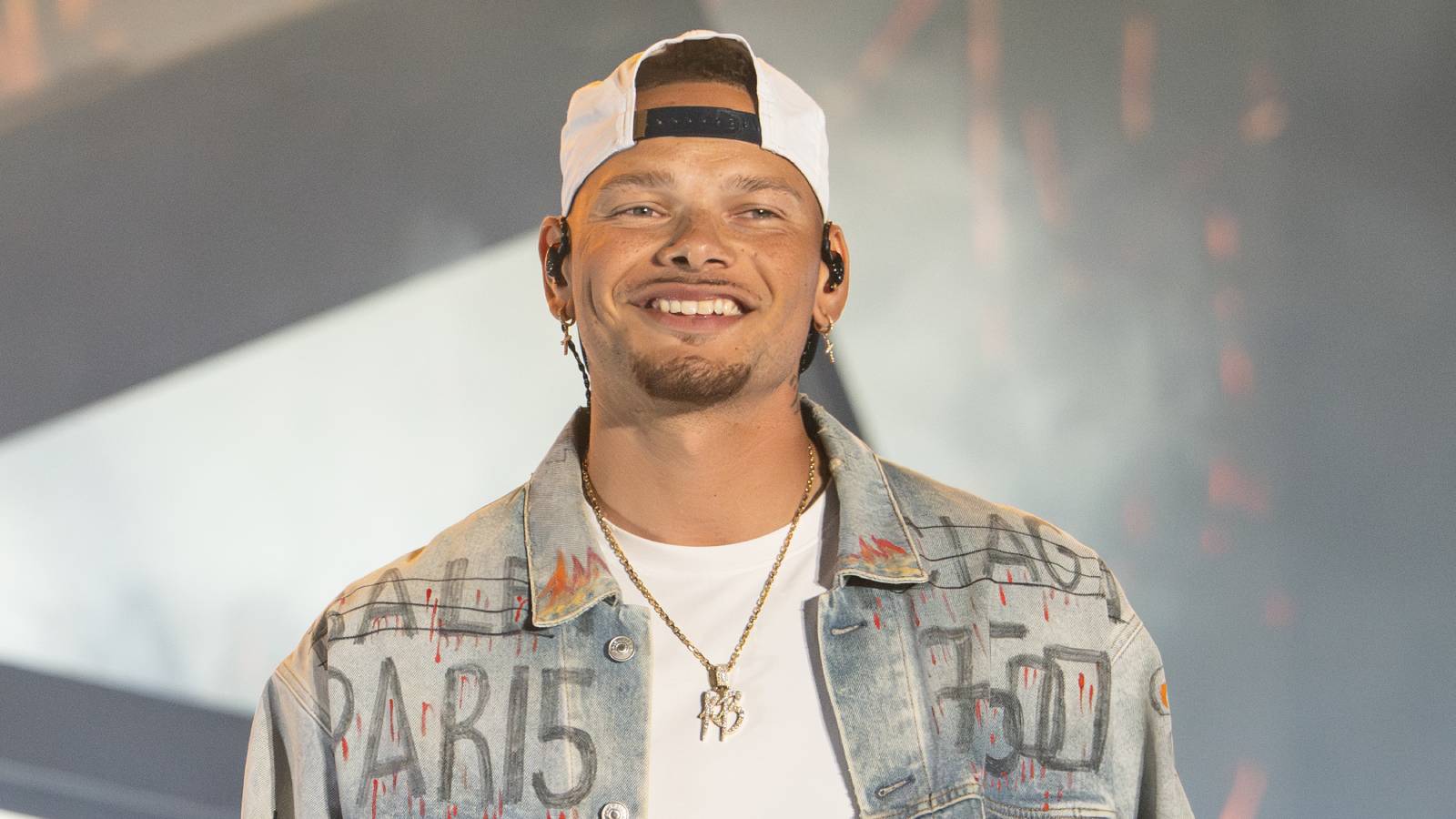 Kane Brown smiling on stage