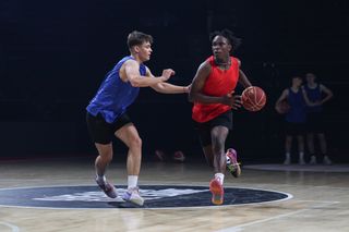 Canon EOS R1 sample image: an action shot of basketball players