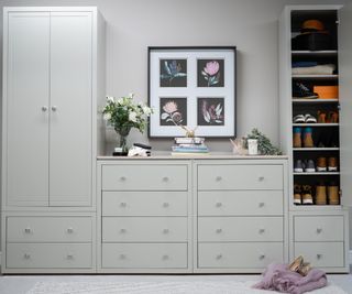 modular pale grey bedroom furniture including wardrobes and chest of drawers