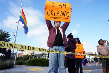 A mourner of the Orlando nightclub shooting