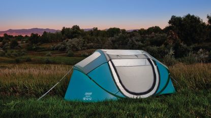 best pop up tent: Coleman Galiano 2 FastPitch pop up tent in a field