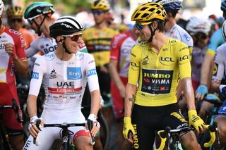 UAE Team Emirates’ Tadej Pogacar (left) chats with Slovenian compatriot and 2020 Tour de France leader Primoz Roglic (Jumbo-Visma) ahead of the start of stage 14