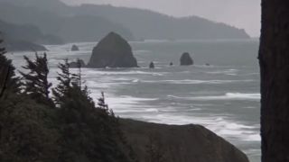 A screenshot from Goonies of the Haystack Rock off the coast of Oregon.