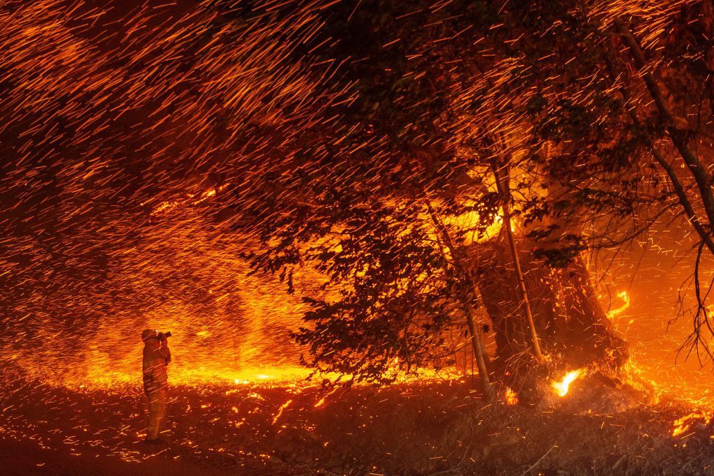 Wind and flames rip through an area near Geyserville, California, during the Kincade Fire on Oct. 24, 2019. 