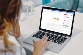 Mockup Of A Woman Working On A Macbook 2316 El