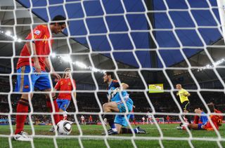 Joan Capdevila, Carles Puyol, Iker Casillas and Gerard Pique of Spain are stunned after conceding a goal by Gelson Fernandes of Switzerland during the 2010 World Cup.