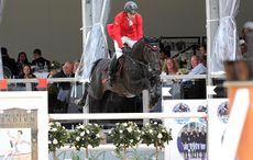 Hans-Dieter Dreher (DE) riding Embassy II DSQ th in the Grand Prix Presented by Qatar at the Longines Global Champions Tour of London taking place on Horse Guards Parade in central London between the 14-16th August 2014