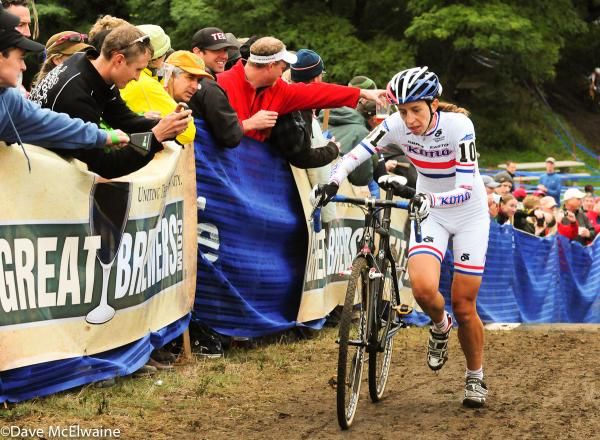 Helen Wyman (Kona) running some uphill stairs