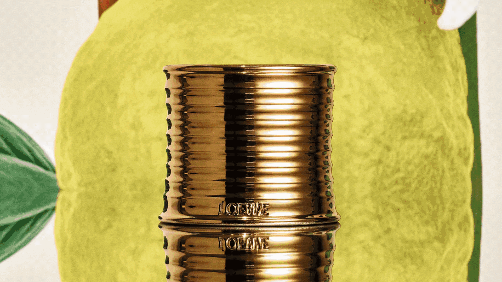 A moving GIF of images featuring scented candles from fashion brands