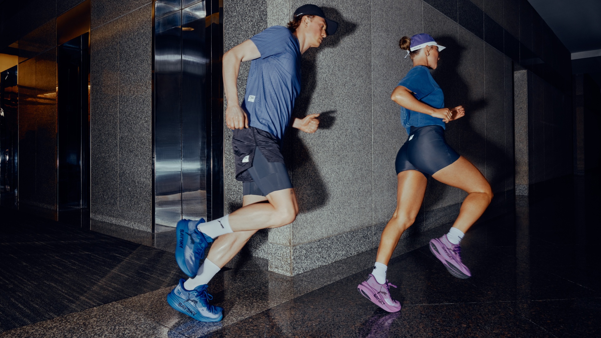 Man and women running indoors