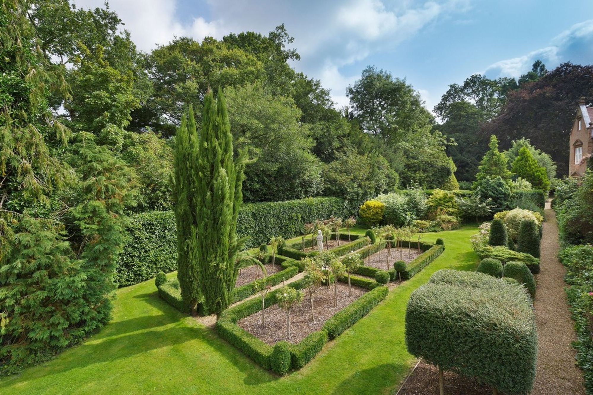 Images of the gardens at Tasburgh Hall, Norfolk