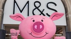 M&S launch giant Percy Pig eggs: A Percy Pig mascot helps to advertise the new Marks & Spencer store on the concourse of Waterloo Statio