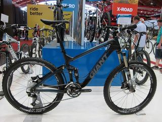 The front end on Giant's Trance X Advanced 2 shares the same outer shape as the top-end flagship but is made from a lesser grade of composite fiber to save money
