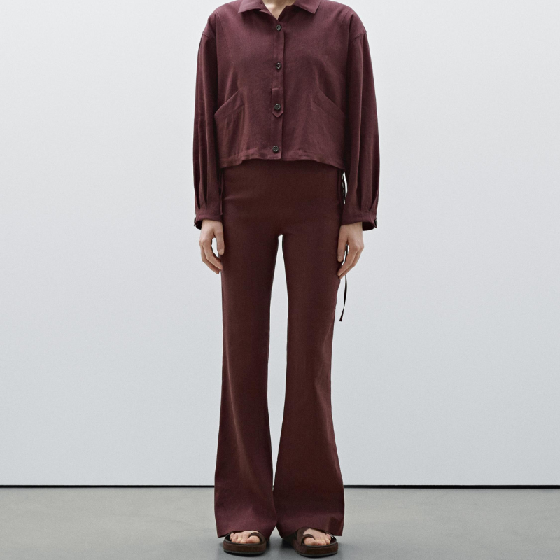 Pair of burgundy flared trousers