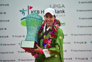 Carlota Ciganda holds the LPGA KEB Hana Bank Championship trophy in 2016