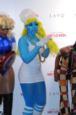 Ashanti as a Smurf Heidi Klum's Halloween party, 2015