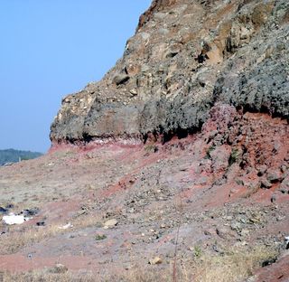 A "red bole" layer between lava flows in the Deccan Traps.