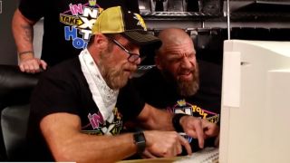 Triple H and Shawn Michaels attempting to use a computer