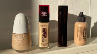 original image of four waterproof foundations lined up against a plain background