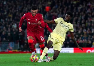 Liverpool midfielder Alex Oxlade-Chamberlain holds off Arsenal's Thomas Partey