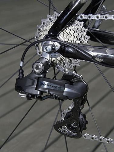 Shimano abandoned the auto-adjust feature of earlier prototypes