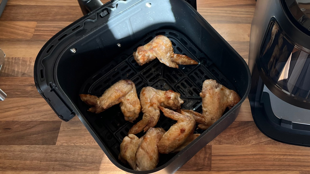 Chicken Wings coooked in the frying basket of the Dreo 6-Quart Air Fryer