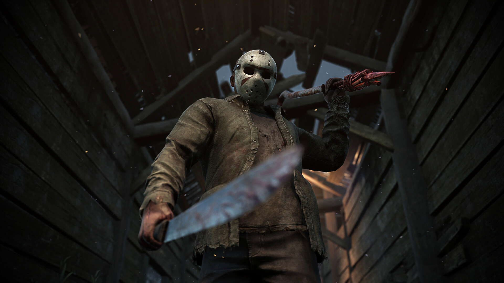 A hulking masked killer looms in a dark wooden shed, gripping a bloodied machete and raising a clawed hand; the low-angle view feels menacing and tense.