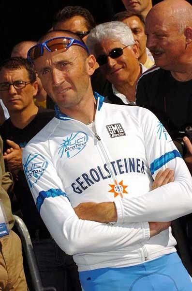 Rebellin wearing the white jersey of ProTour leader.