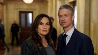 Mariska Hargitay and Peter Scanavino as Olivia and Carisi side-by-side in Law & Order: SVU season 26 episode 14