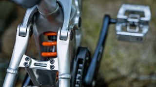 Close up view on the suspension of Mondraker downhill bike