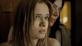 Sara Paxton looks ahead with fright in a motel room in The Last House On The Left.