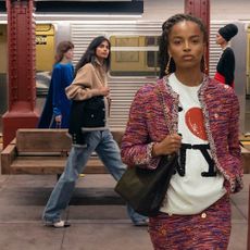 models in the chanel metiers d art show on the new york city subway