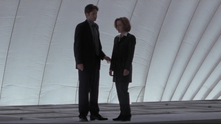 Gillian Anderson as Dana Scully and David Duchovny as Fox Mulder in The X-Files: Fight the Future
