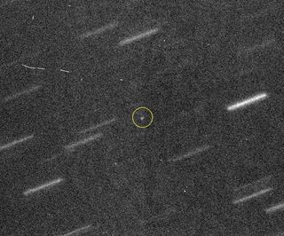 Asteroid 2011 AG5 pictured among other asteroids.