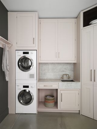 pink utility room by Roundhouse