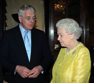 John Major (left) with Queen Elizabeth (right)