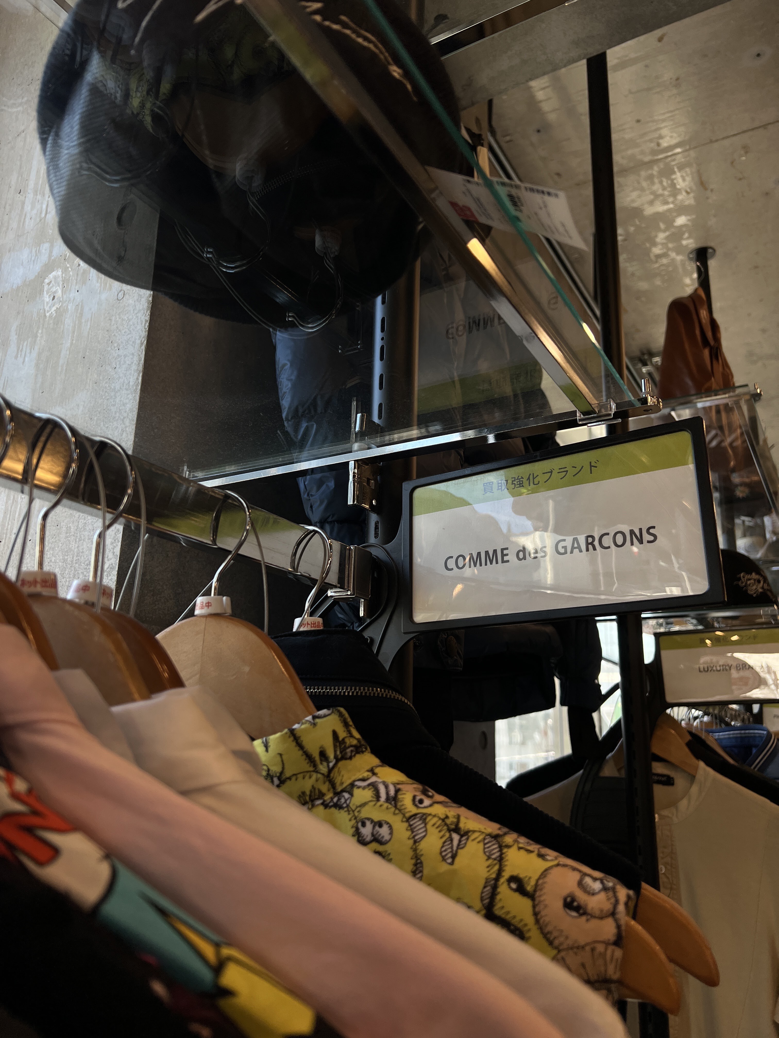 Photograph of clothing rack at Ragtag Tokyo Vintage Store.